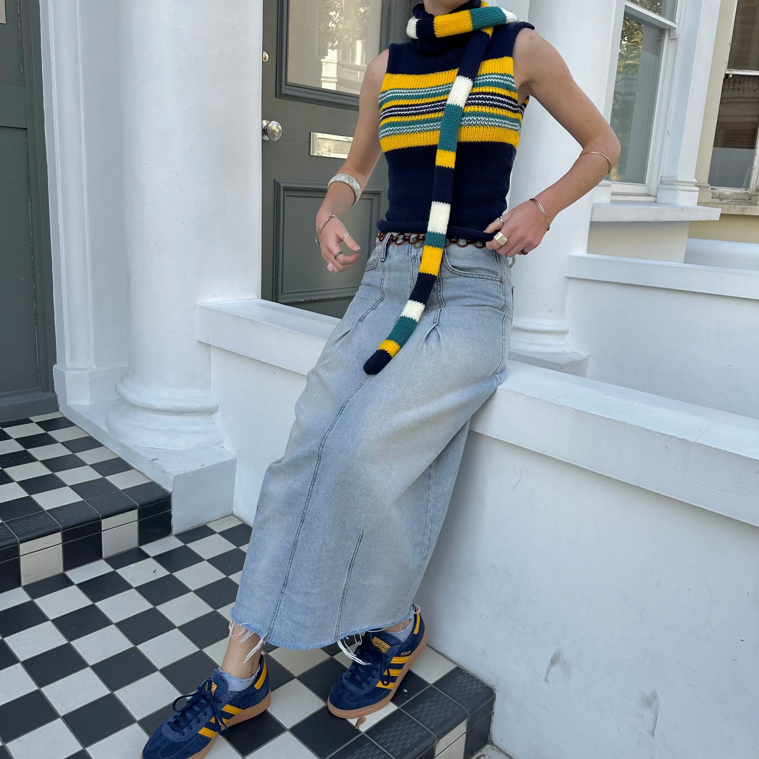 Handmade knitted stripy skinny scarf in navy, cream, yellow and teal