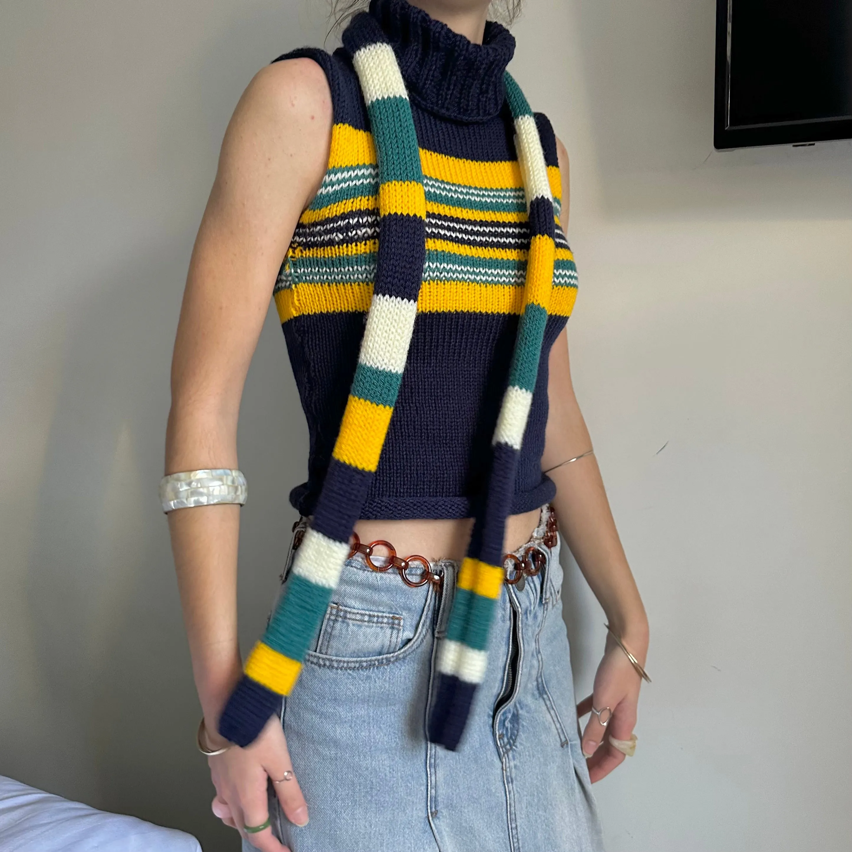 Handmade knitted stripy skinny scarf in navy, cream, yellow and teal